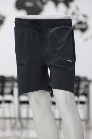 Black shorts on a mannequin with a blurred background